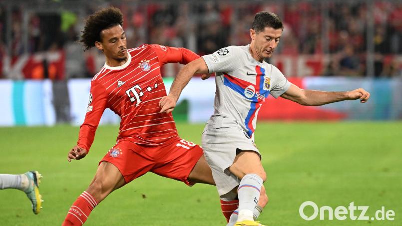 Die Bayern um Leroy Sané (links) verwickelten ihren ehemaligen Mitspieler Robert Lewandowski immer wieder in intensive Zweikämpfe. Bild: Sven Hoppe/dpa