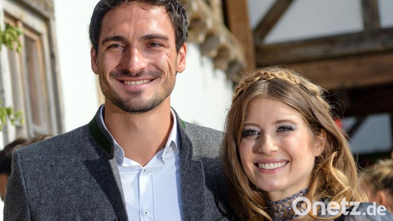 Fußballspieler Mats Hummels und seine damalige Frau Cathy Hummels auf dem Oktoberfest. Bild: Matthias Balk/dpa/Archivbild