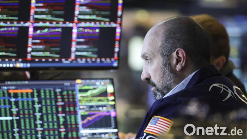 Ein Händler arbeitet an der New Yorker Börse. Bild: Wang Ying/dpa