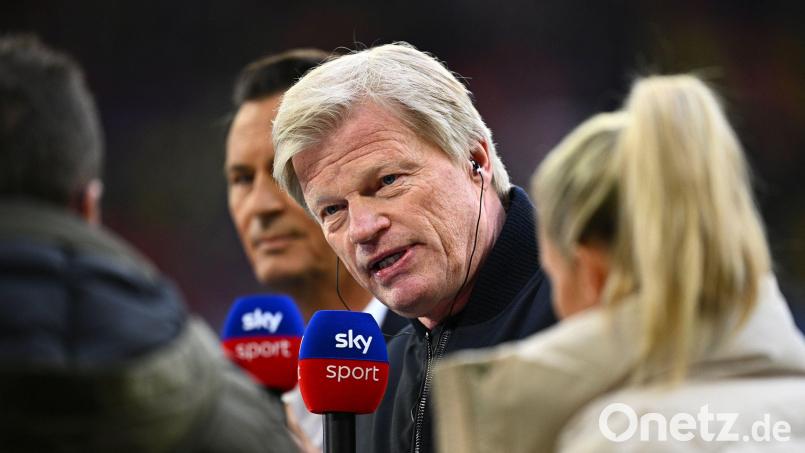 Bayern-Boss Oliver Kahn (Mitte) knöpft sich Lothar Matthäus vor. Bild: Tom Weller/dpa