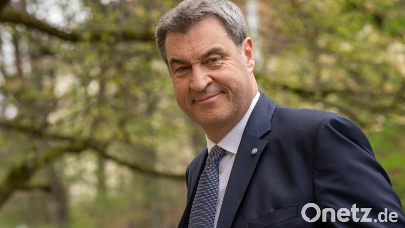 Markus Söder geht nach der bayerische Kabinettssitzung zur Pressekonferenz. Bild: Peter Kneffel/dpa