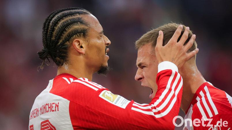 Joshua Kimmich (rechts) feiert mit Leroy Sané dessen 2:0. Bild: Christian Charisius/dpa
