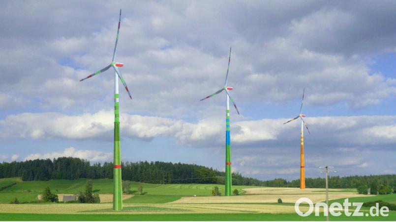 Nicht nur Grau, Weiß und Rot: Luftfahrt-Vorschriften standen ästhetisch gestalteten Windkraftanlagen lange Zeit im Weg. Hier ein Versuch von Designer Reinhold Geyer, wie Windräder künftig ausschauen könnten. Bildmontage: Reinhold Geyer/exb