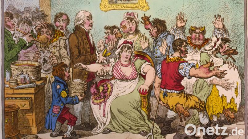 Diese Karikatur aus dem Jahr 1802 zeigt überspitzt Menschen, die Angst vor der Pockenimpfung hatten. Sie befürchteten, dass sie sich in Kühe verwandeln. Bild: James Gillray/https://commons.wikimedia.org/w/index.php?curid=2289666