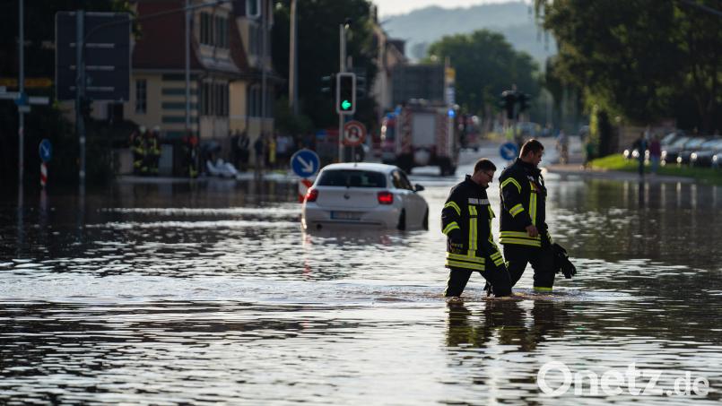 Elementarschäden durch Hagel, Stürme und durch Starkregen bedingte Überschwemmungen nehmen durch den Klimawandel zu. Eine entsprechende Versicherung zur Schadensdeckung ist demnach für viele Hausbesitzer unabdingbar. Archivbild: Nicolas Armer