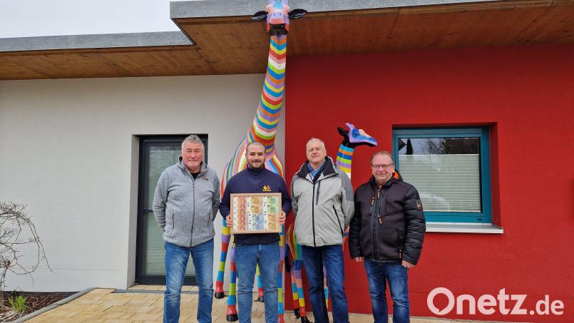 Bei der Spendenübergabe (von links): Peter Junghans, Christoph Köhler, Martin Kroher und Peter Heldmann. Bild: Heldmann/exb