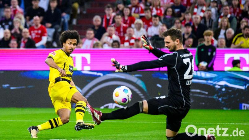 Karim Adeyemi (l) brachte den BVB früh in Führung. Bild: Tom Weller/dpa