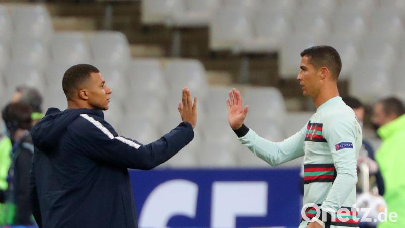 Treffen im EM-Viertelfinale aufeinander: Frankreichs Kylian Mbappé (l) und Portugals Cristiano Ronaldo. Bild: Thibault Camus/AP/dpa
