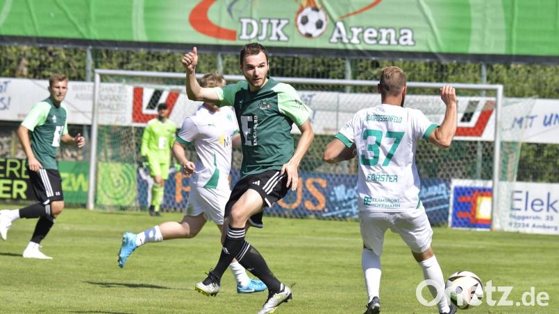 Die DJK Ammerthal (im Bild Daniel Gömmel, grünes Trikot, in der Partie gegen den TSV Neudrossenfeld/1:1) empfängt am Sonntag den ASV Cham. Bild: Ziegler