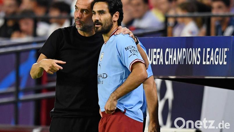 Pep Guardiola (l) und Ilkay Gündogan: Bald wieder in einem Team? Bild: Jose Breton/AP/dpa