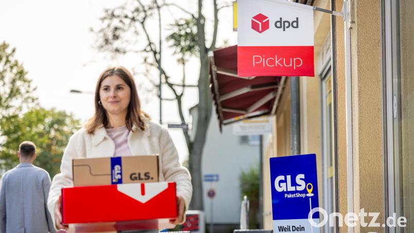 GLS-Shops sollen künftig auch DPD-Shops werden und umgekehrt. Außerdem wollen die Firmen gemeinsame Paketstationen errichten. Bild: dpa