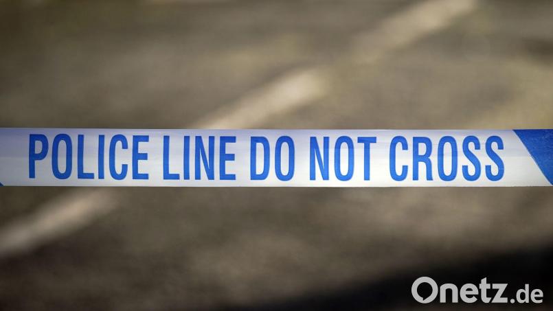 Zwei Männer wurden in einem Vorort von Birmingham von Schüssen getroffen. (Symbolbild) Bild: Peter Byrne/Press Association/dpa