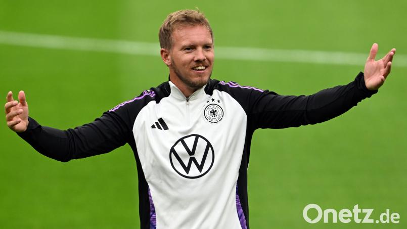 Komm Welt, lass dich umarmen. Bundestrainer Julian Nagelsmann: Bild: Federico Gambarini/dpa