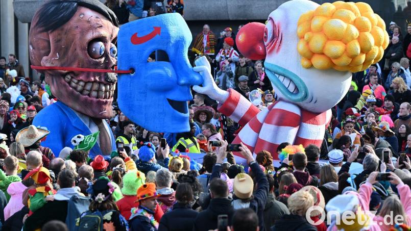 Die Bundestagswahlen finden wenige Tage vor dem Straßenkarneval - hier beim Rosenmontag in Düsseldorf - statt (Illustration) Bild: Federico Gambarini/dpa