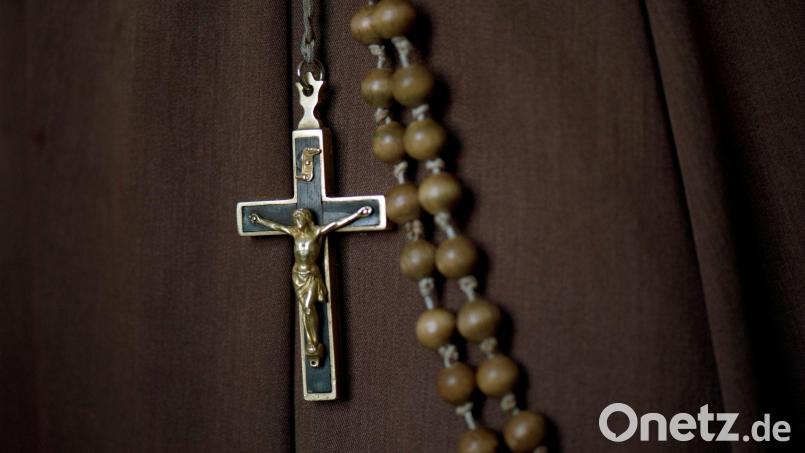 87.184 Menschen traten im vergangenen Jahr in Bayern aus der katholischen Kirche aus, 39.486 aus der evangelischen. Symbolbild: Arno Burgi/dpa