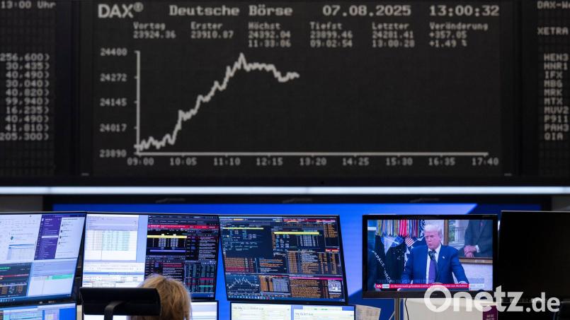 Der Zollstreit sorgt für Umsatzeinbußen, aber viele Dax-Konzerne verdienen trotzdem noch gut. (Symbolbild) Bild: Boris Roessler/dpa
