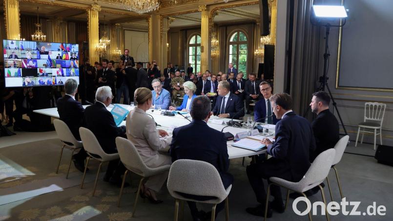 Kanzler Merz nahm per Video an dem Treffen in Paris teil. Bild: Ludovic Marin/Pool AFP/AP/dpa