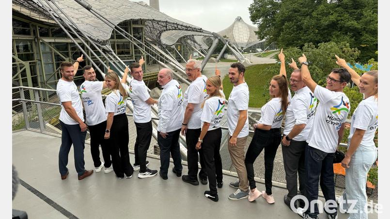Sportler und Politiker machen sich für eine Olympia-Bewerbung Münchens stark. Bild: Manuel Schwarz/dpa