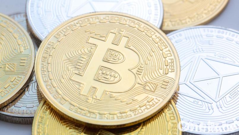 Der Bitcoin ist erstmals über die Marke von 125.000 US-Dollar gestiegen. Bild: Fernando Gutierrez-Juarez/dpa