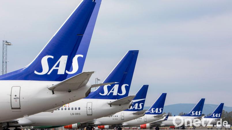 Ein Mann ist Berichten zufolge mit einer Beschwerde gegen die skandinavische Airline wegen angeblicher Fürze seiner Mitreisenden gescheitert. (Symbolfoto) Bild: Ole Berg-Rusten/NTB Scanpix/dpa