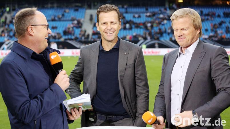 Oliver Bierhoff (M.) und Oliver Kahn (r) zählen die deutsche Mannschaft nicht zu den WM-Titelkandidaten. (Archivbild) Bild: picture alliance / dpa
