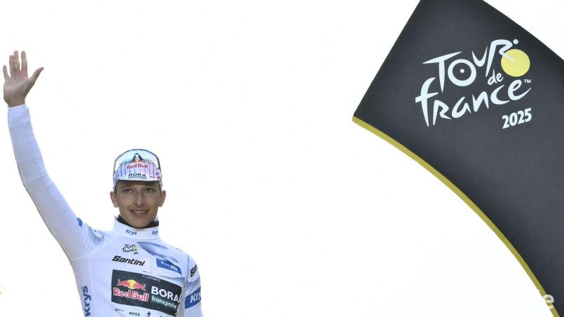 Bei der Tour wieder dabei: Florian Lipowitz Bild: Marco Bertorello/AFP/dpa