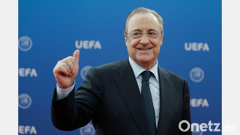 Nach einem weiteren juristischen Erfolg im Streit mit der UEFA um die Super League will Real Madrid unter Club-Präsident Florentino Perez Schadensersatz geltend machen. Bild: Claude Paris/AP/dpa