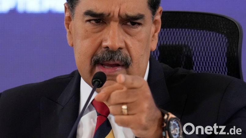 Russland ist mit dem venezolanischen Präsidenten Maduro verbündet. Bild: Ariana Cubillos/AP/dpa