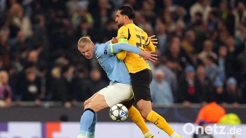 Emre Can (r) zeigte bei seinem Comeback gleich großen Einsatz. Bild: Martin Rickett/PA Wire/dpa