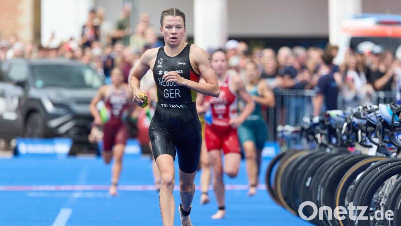 Bei ihrer ersten 70.3-Ironman-WM schafft es Tanja Neubert direkt aufs Podium. (Archivbild) Bild: Georg Wendt/dpa