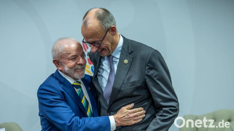 „Er kam nach Brasilien, aber sein Kopf blieb in Berlin“, sagt Lula über Merz. Bild: Michael Kappeler/dpa-pool/dpa