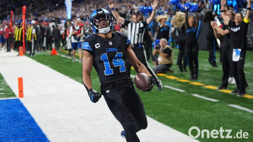 Amon-Ra St. Brown kam auf einen Touchdown. Bild: Paul Sancya/AP/dpa