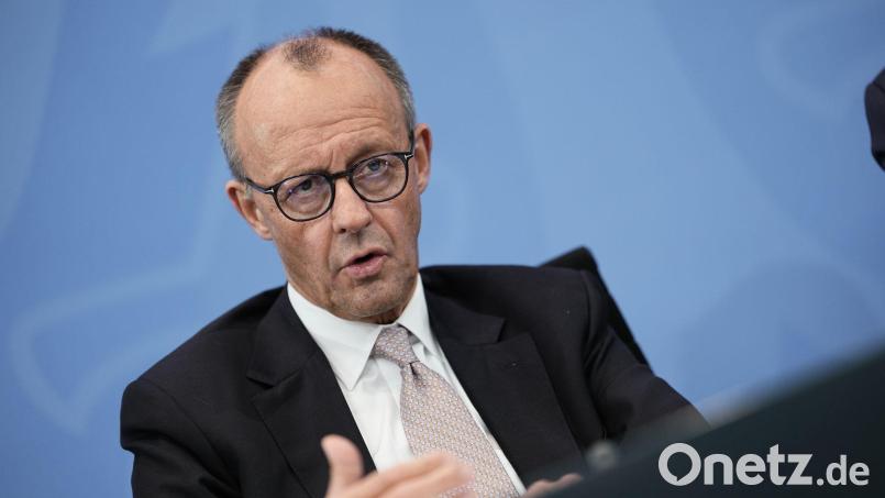 Merz zeigt sich zuversichtlich für die Abstimmung am Freitag. Bild: Michael Kappeler/dpa