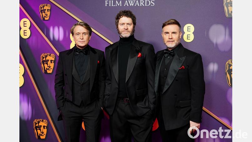 Take That sind inzwischen nur noch zu dritt unterwegs - ohne Robbie Williams. (Archivbild) Bild: Ian West/PA Wire/dpa