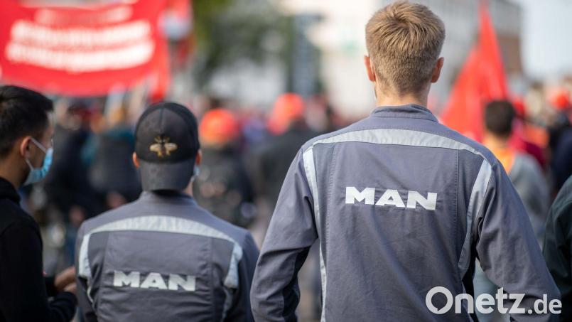 Beim Bus- und Lastwagenhersteller MAN gibt es eine Einigung zum geplanten Stellenabbau. Bild: Daniel Karmann/dpa