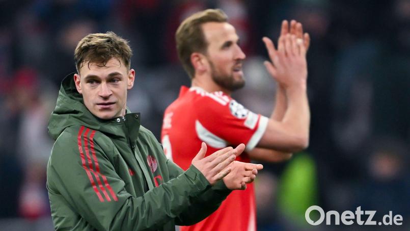 Das erste Etappenziel ist erreicht: Joshua Kimmich (links) und Harry Kane feiern den Einzug ins Achtelfinale. Bild: Sven Hoppe/dpa