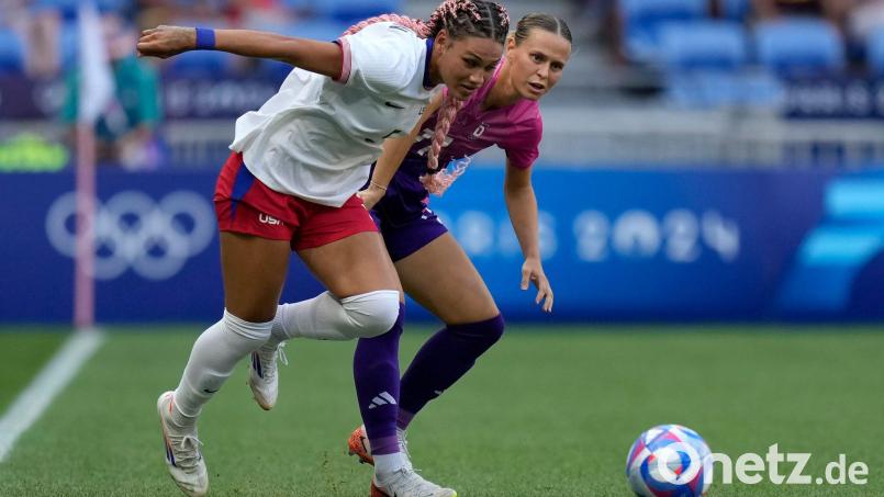 Trinity Rodman (vorn) bleibt in den USA. (Archivbild) Bild: Silvia Izquierdo/AP/dpa