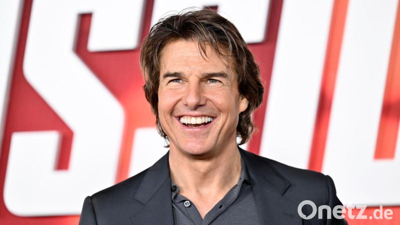 Tom Cruise ist für seine spektakulären Actionfilme bekannt - nun ließ er in einem programmierten Video die Fäuste fliegen. (Archivbild) Bild: Evan Agostini/AP/dpa