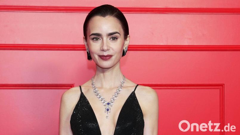 Schauspielerin Lily Collins (36) soll in einem Film über die Arbeiten an der Komödie „Frühstück bei Tiffany“ die Film-Ikone Audrey Hepburn verkörpern. (Archivbild) Bild: Aurelien Morissard/AP/dpa