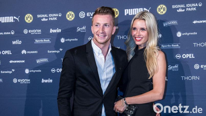 Ex-Nationalspieler Marco Reus mit Ehefrau Scarlett Gartmann. (Archivfoto) Bild: picture alliance / Paul Zinken/dpa