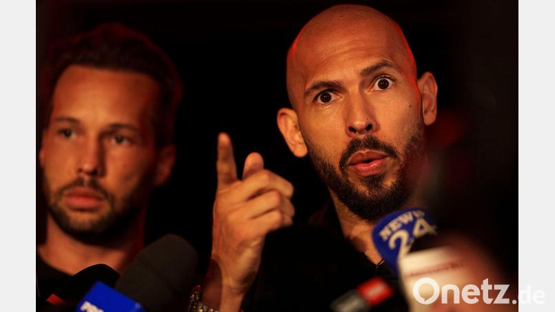 Die Tate Brothers: links Tristan, rechts Andrew. (Archivbild) Bild: Vadim Ghirda/AP/dpa