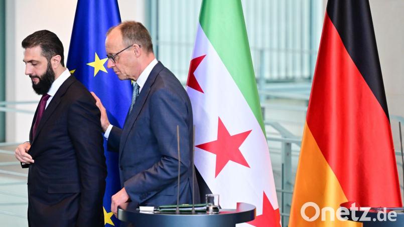 Wer hat die 80-Prozent-Zielmarke genannt, Syriens Übergangspräsident Ahmed al-Scharaa oder Kanzler Friedrich Merz (CDU)? Nicht so wichtig, meint die Bundesregierung. Bild: Sebastian Christoph Gollnow/dpa