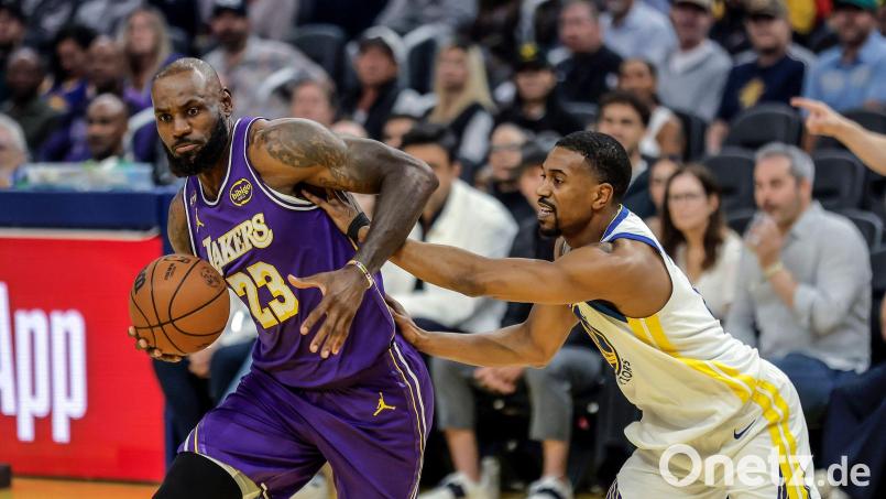 LeBron James (links) führte die Lakers zu einem Sieg bei den Warriors. Bild: Carlos Avila Gonzalez/San Francisco Chronicle/AP/dpa