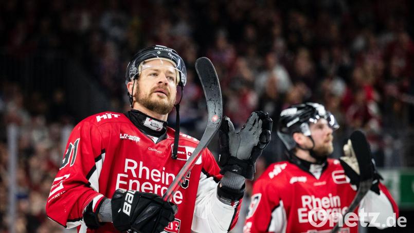 Eishockey-Profi Moritz Müller von den Kölner Haien (l). Bild: Marius Becker/dpa