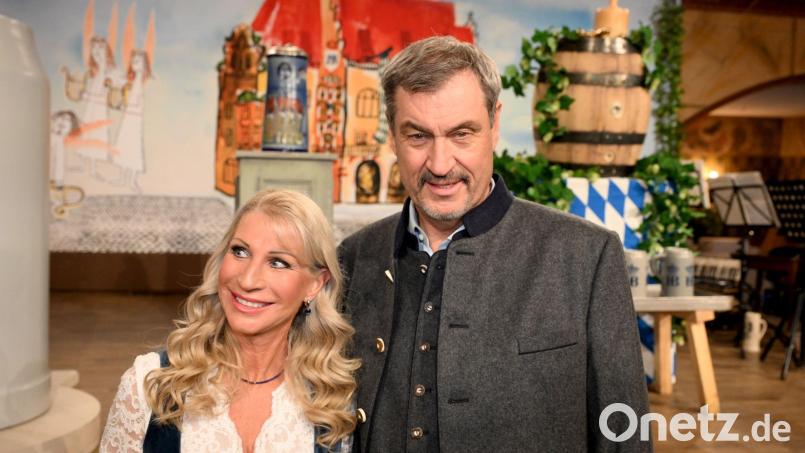 Karin Baumüller-Söder und Markus Söder haben zusammen drei Kinder. (Archivbild) Bild: Felix Hörhager/dpa