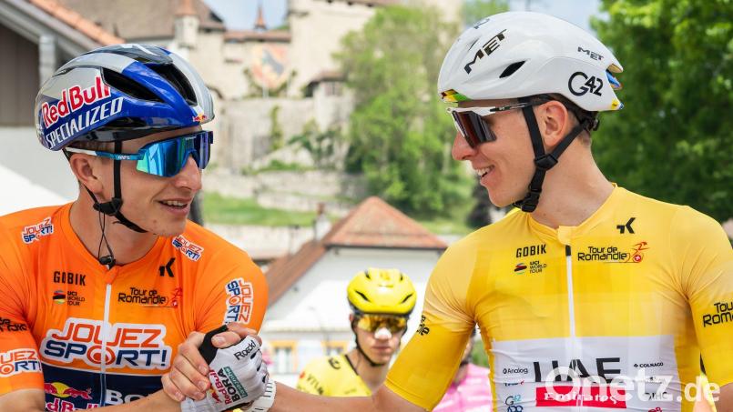 Florian Lipowitz (l) musste sich nur Tadej Pogacar geschlagen geben. Bild: Jean-Christophe Bott/KEYSTONE/dpa
