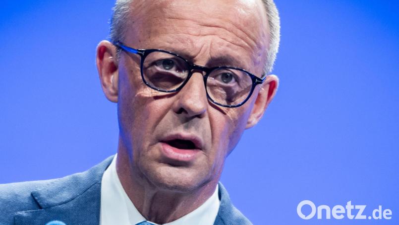 Der Kanzler bekennt sich am Vorabend des Regierungs-Jahrestags zur Zusammenarbeit mit der SPD. Bild: Michael Kappeler/dpa