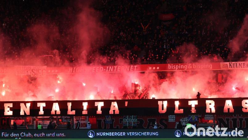 Die Polizei hat Wohnungen von Mitgliedern der Ultra-Szene in Nürnberg und Köln durchsucht. (Symbolbild) Bild: Daniel Karmann/dpa