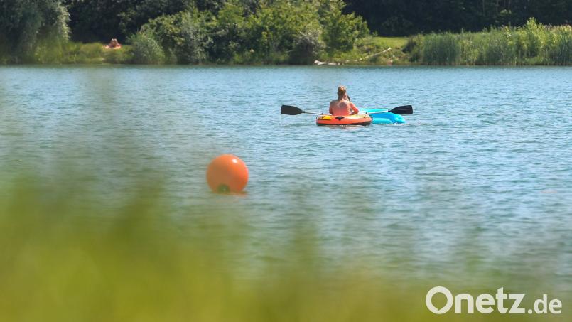 Ein 20-jähriger Mann stirbt nach einem Badeunfall am Guggenberger See trotz Reanimationsversuchen. Symbolbild: Armin Weigel