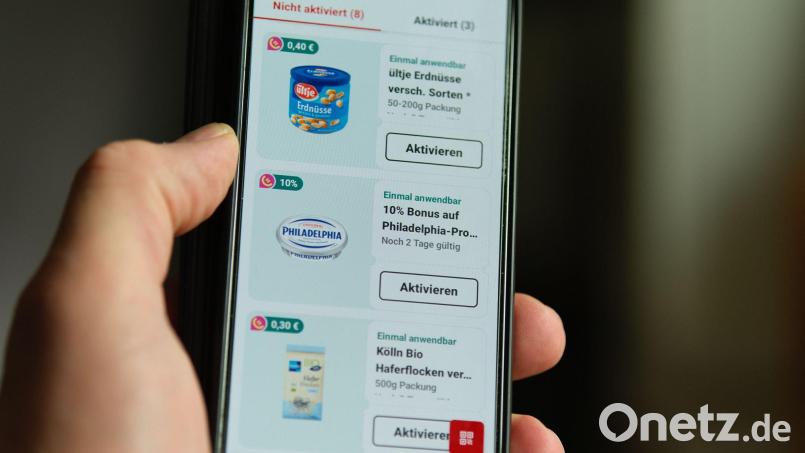 Rewe lockt Kunden mit einem Bonus - der Gesamtpreis der betreffenden Produkte wird nicht angezeigt. Bild: Georg Hilgemann/dpa